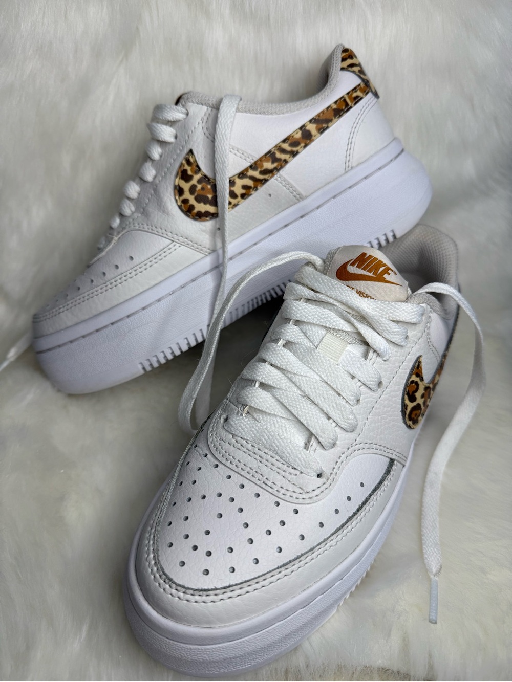 Nike Women’s White Platform Sneakers with Leopard Swoosh Accent